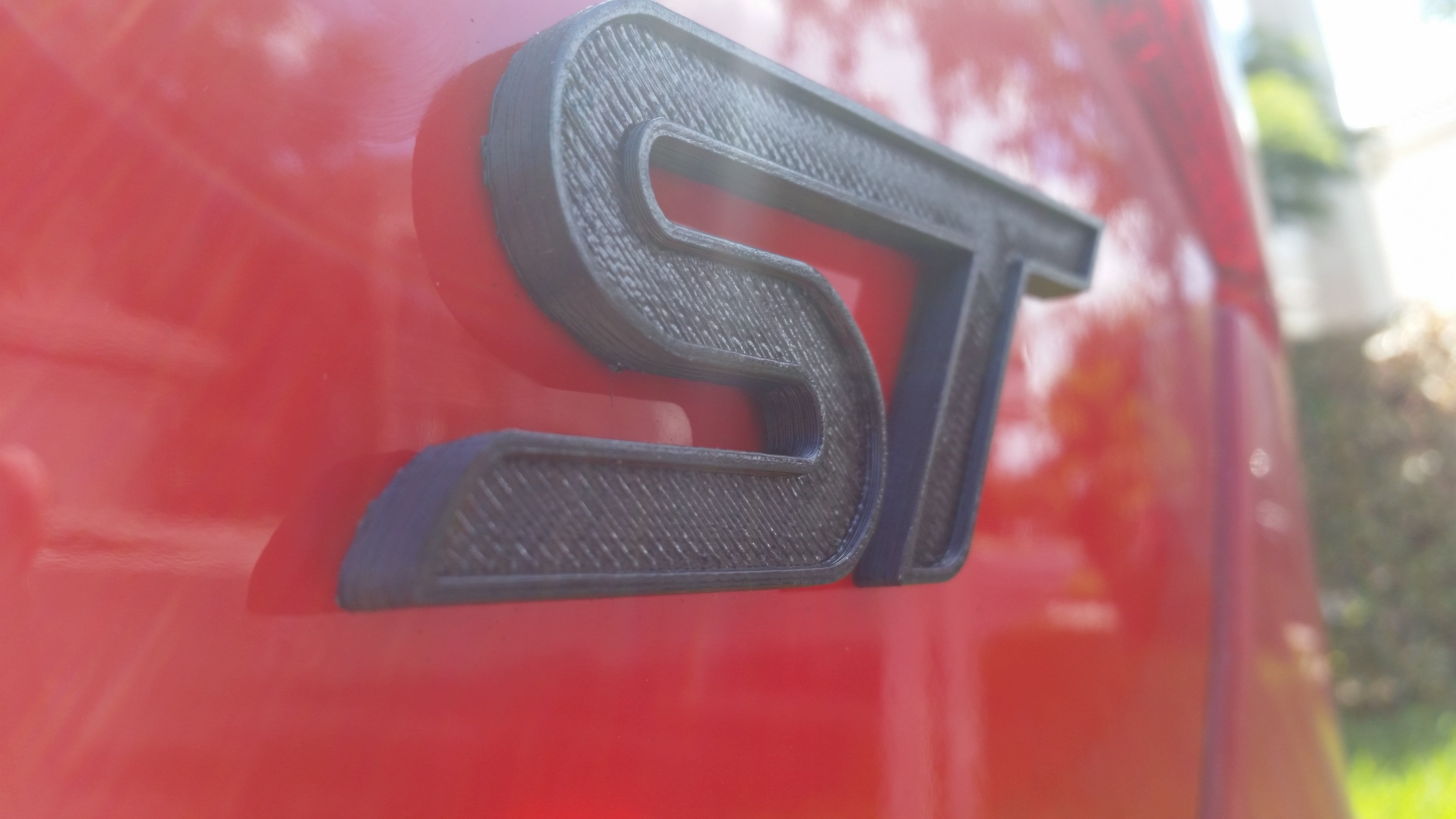 2013-2019+ Ford Focus / Ford Fiesta ST Emblem "ST" - Rear | Velossa Tech Design